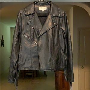 Faux Leather Jacket with fringe.